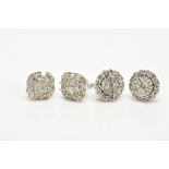 TWO PAIRS OF WHITE METAL, DIAMOND CLUSTER EARRINGS, the first pair each of a circular form, with a