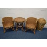 A WICKER THREE PIECE CONSERVATORY SUITE, comprising two armchairs and a table together with a wicker