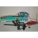 A BOXED BOSCH AHS 52-16 ELECTRIC HEDGE TRIMMER and a Black and Decker cordless hedge trimmer (all