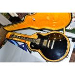 A SAXON LES PAUL ELECTRIC GUITAR, in black with gold plated hardware, bolt on neck, rosewood
