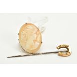 A CAMEO RING AND A STICK PIN, the yellow metal, claw set cameo of oval design, depicting a lady in