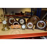 NINE VARIOUS 20TH CENTURY CLOCKS AND TIMEPIECES, including a Kundo anniversary clock, a Smiths brown