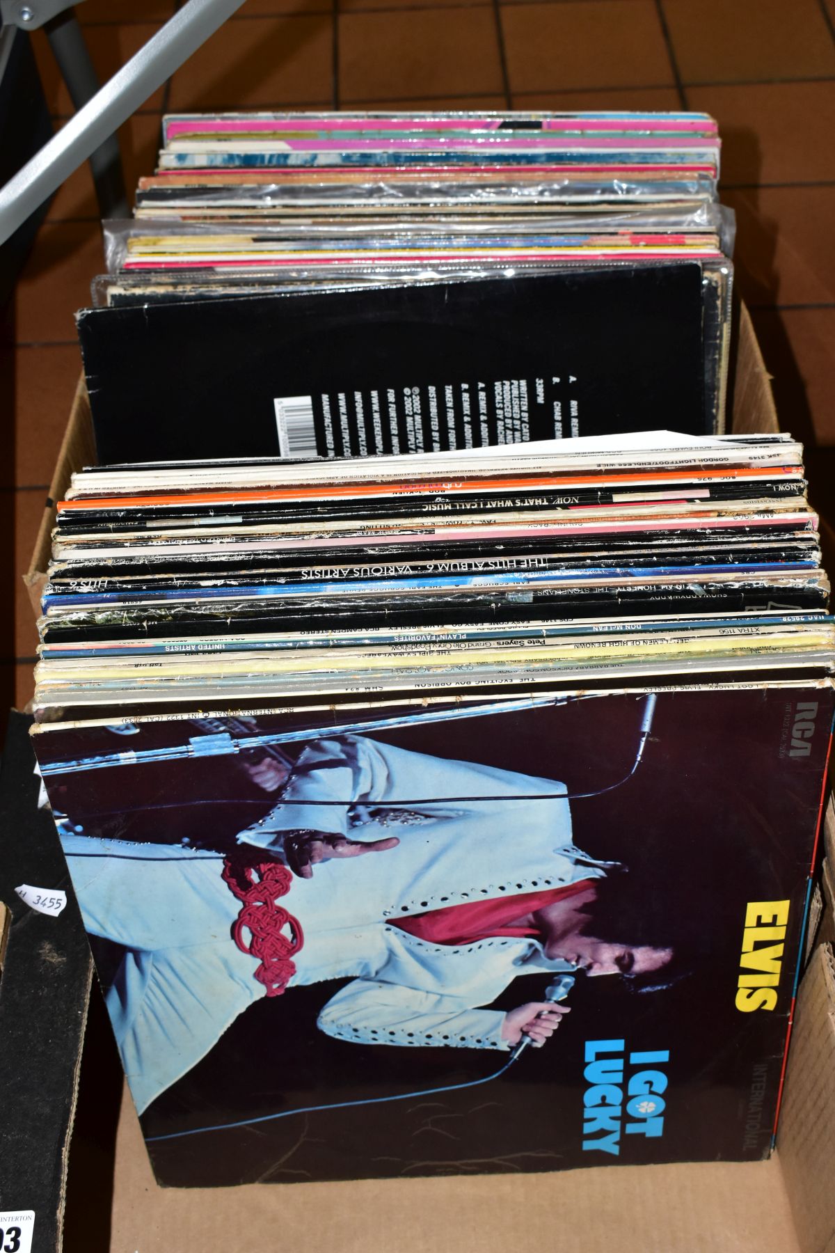 TWO TRAYS CONTAINING OVER EIGHTY LPs AND 12'' SINGLES including a number of Elvis repressings, a