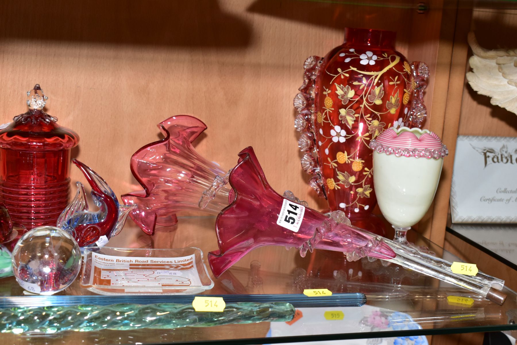 A GROUP OF VICTORIAN AND LATER COLOURED GLASSWARE, including epergne trumpets, modern glass