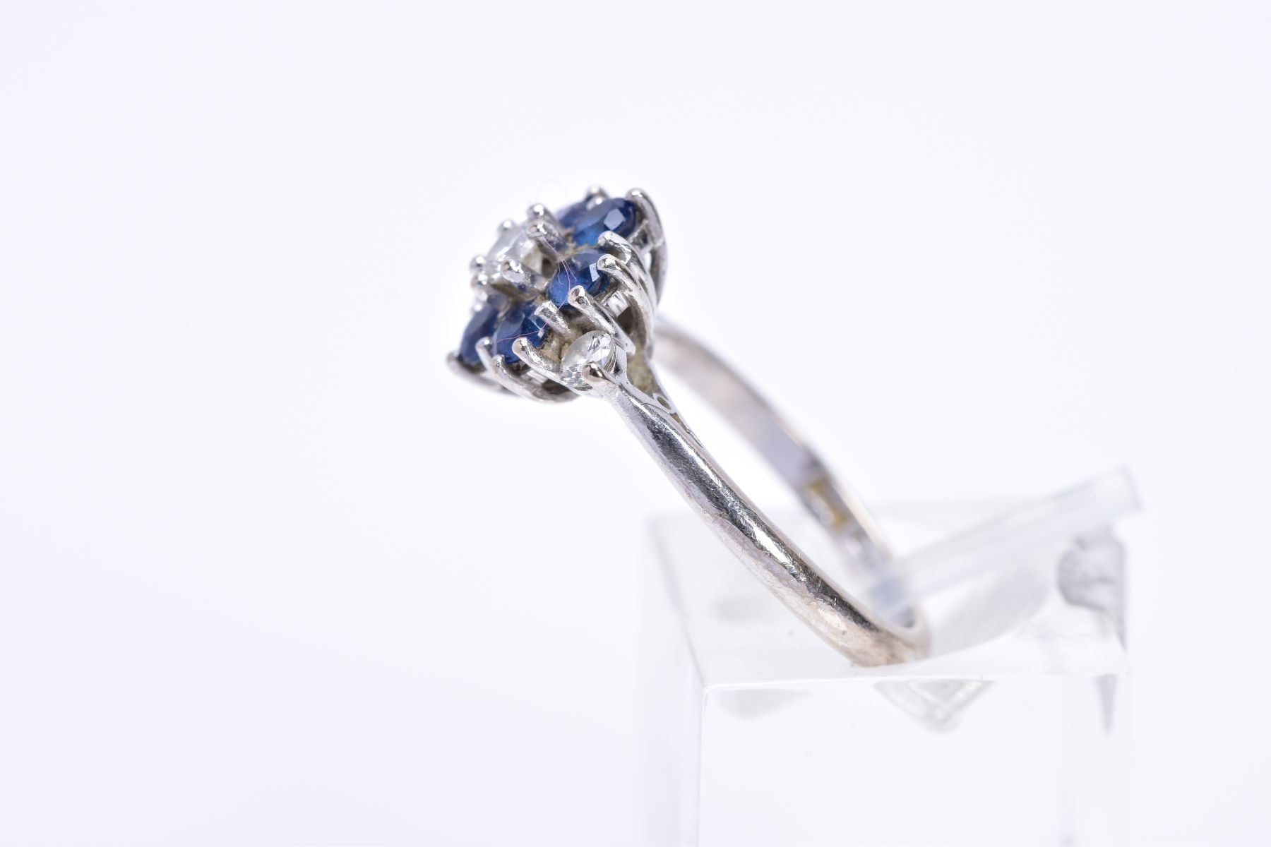 AN 18CT WHITE GOLD DIAMOND AND SAPPHIRE CLUSTER RING, the raised cluster designed with a central - Image 2 of 3