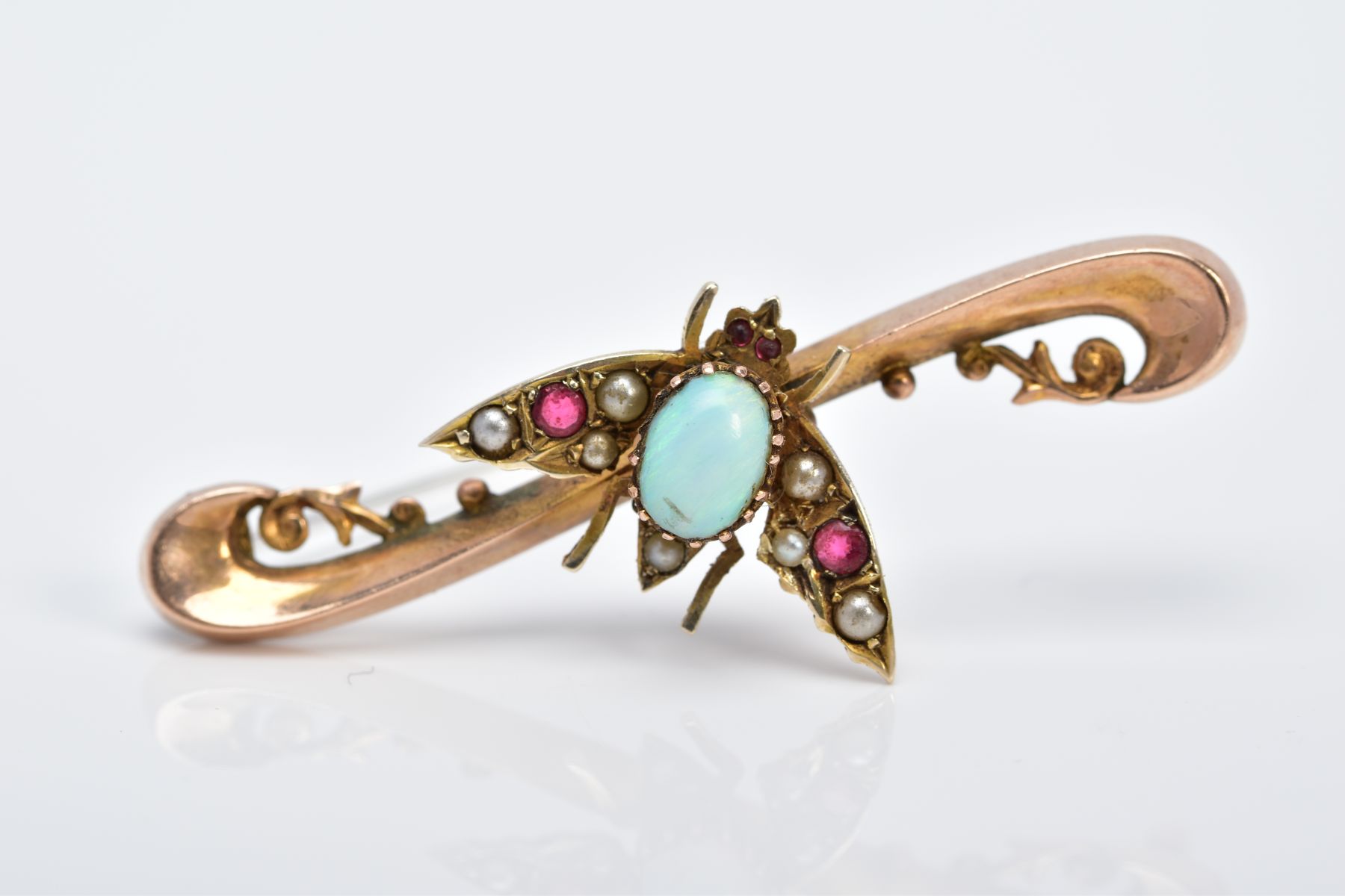 A 9CT GOLD OPAL, RUBY AND PEARL BEETLE BROOCH, the scroll designed bar brooch, with a central beetle - Image 2 of 4