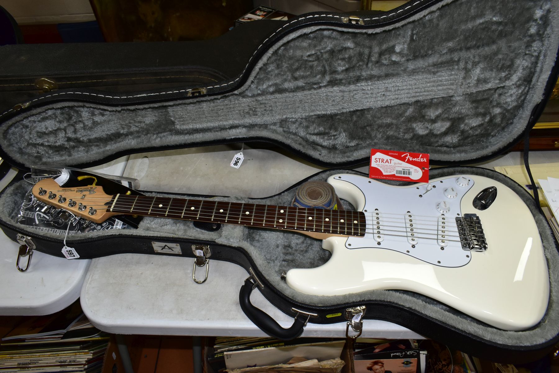 A 2008 MEXICAN FENDER STRATOCASTER Ser No MZ 8019434 in white with white scratch plate, pickup