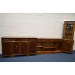 A YEW WOOD SIDEBOARD, with three drawers with triple section bookcase below, together with another