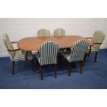 A REPRODUCTION BURR WALNUT AND MAHOGANY DRAW LEAF DINING TABLE, one additional leaf, extended length