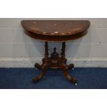A REPRODUCTION VICTORIAN STYLE BURR WALNUT AND MAEQUETRY INLAID DEMI LUNE TABLE the fold over top