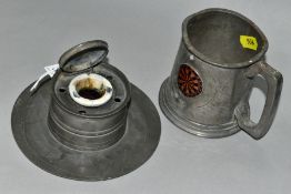 A VICTORIAN PEWTER INKWELL OF DRUM FORM, hinged lid enclosing ceramic liner, four quill holders,