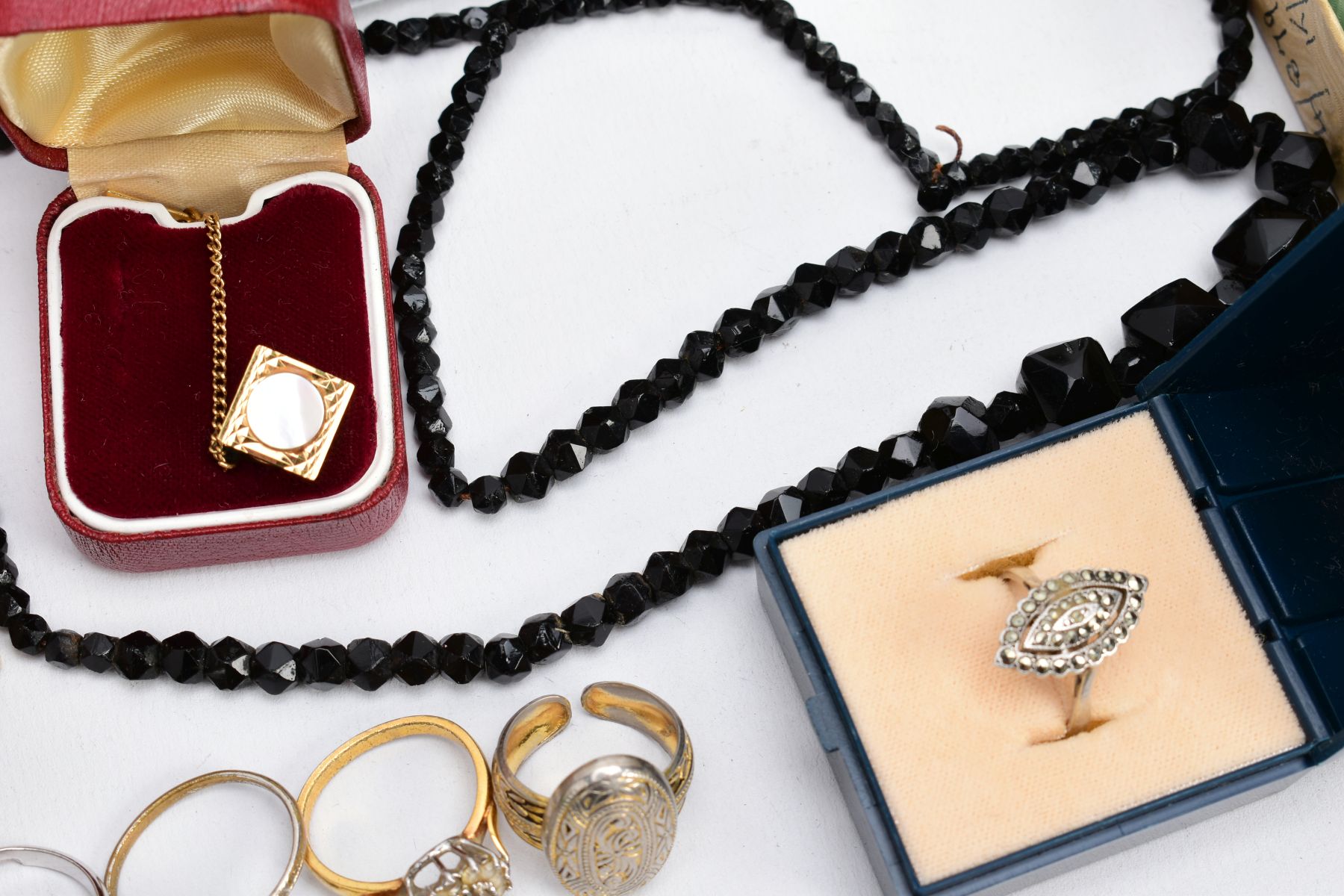 A BOX OF MOSTLY COSTUME JEWELLERY, to include a silver foliate engraved hinged bangle (large dent to - Image 3 of 10