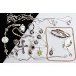 A SELECTION OF JEWELLERY, to include a white metal open work star pendant necklace, the pendant