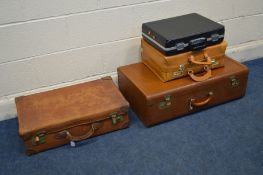 A VINTAGE BROWN LEATHER SUITCASE together with a snake skin style leather suitcase a tan briefcase