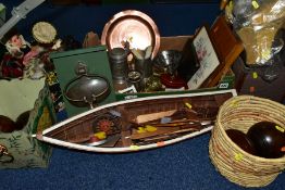FOUR BOXES/BASKETS SUNDRIES, to include distressed model boat, cased projector, crown green bowls,
