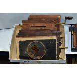 ELEVEN MAGIC LANTERN SLIDES, to include six lever slides, four slipping slides and a chromotrope