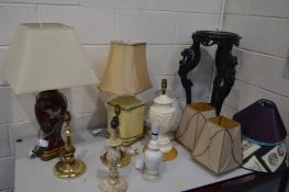 SEVEN VARIOUS TABLE LAMPS with a collection of shades together with an ebonised oriental torchere