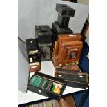 TWO MAGIC LANTERN PROJECTORS AND FOUR WOODEN BOXES OF ASSORTED 3¼ LANTERN SLIDES, the larger