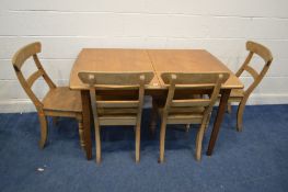 A MID 20TH CENTURY TEAK EXTENDING DINING TABLE with one additional leaf extended length 184cm x