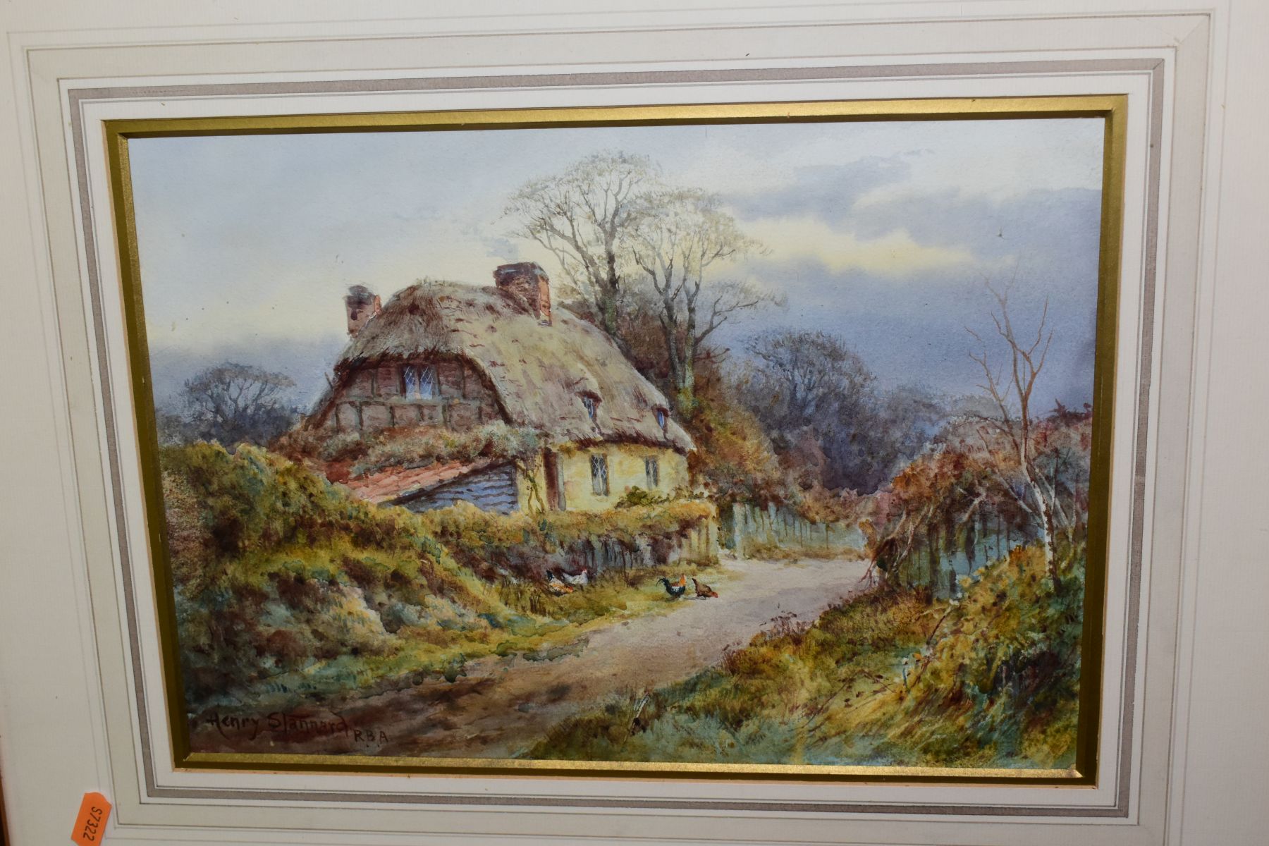 HENRY STANNARD R.B.A (1844-1920), a thatched cottage in a rural setting, with an elderly couple - Image 2 of 5