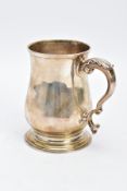 A SILVER GEORGE III TANKARD, of a plain polished design, bell shaped body on a circular base with