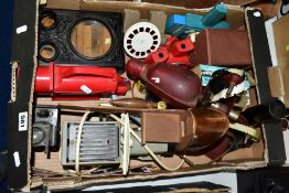 A BOX OF OPTICAL TOYS, including two stereoscopic viewers, two Viewmasters, a Kaleidoscope, a '