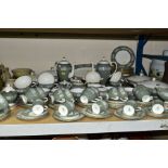 A WEDGWOOD ASIA PART DINNER SERVICE, comprising twelve teacups, thirteen saucers, six coffee cans