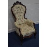 A VICTORIAN MAHOGANY SPOON BACK ARMCHAIR