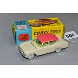 A BOXED CORGI TOYS FORD CONSUL CLASSIC, No 234, beige body with pink roof, lemon interior, flat spun