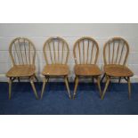 A SET OF FOUR ERCOL MODEL 400 BLONDE ELM AND BEECH KITCHEN CHAIRS (sd to finish)