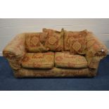 AN UPHOLSTERED TWO SEATER SETTEE width 186cm