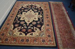 A LATE 20TH CENTURY YATZ CARPET RUNNER 300cm x 79cm together with a black and brown rug (2)