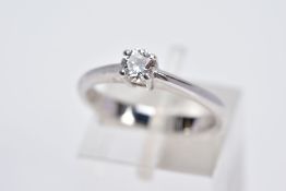 AN 18CT WHITE GOLD SINGLE STONE DIAMOND RING, the claw set round brilliant cut diamond within a