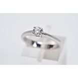 AN 18CT WHITE GOLD SINGLE STONE DIAMOND RING, the claw set round brilliant cut diamond within a