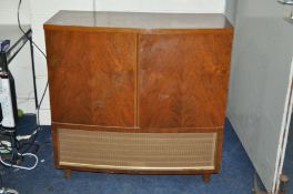 A BUSH RG66 VALVE RADIOGRAM in walnut cabinet ( PAT pass and radio working turntable needs