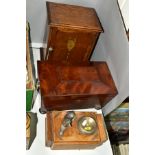 AN EDWARDIAN OAK SMOKERS CABINET, with Neo-Classical style decoration transferred to the door,