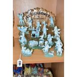 A TUDOR MINT 'ICE DRAGONETS' DISPLAY STAND AND SEVENTEEN DRAGON FIGURES, including Greedy Guts,