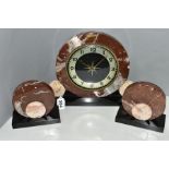 AN ART DECO MARBLE AND BLACK SLATE CLOCK GARNITURE OF CIRCULAR FORM, the dial with silvered