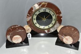AN ART DECO MARBLE AND BLACK SLATE CLOCK GARNITURE OF CIRCULAR FORM, the dial with silvered