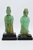 TWO ORIENTAL CARVED FIGURES, believed to be green fluorite, each with a wooden base (one base