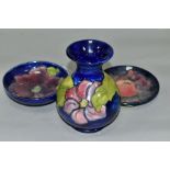 THREE PIECES MOORCROFT POTTERY, comprising small footed bowl 'Clematis' on blue ground, impressed