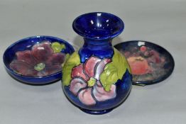 THREE PIECES MOORCROFT POTTERY, comprising small footed bowl 'Clematis' on blue ground, impressed