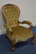 A LATE VICTORIAN WALNUT SPOONBACK OPEN ARMCHAIR with olive green upholstery