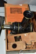 AN ERNST PLANK TOY MAGIC LANTERN IN ORIGINAL WOODEN BOX, together with five mechanical slides,