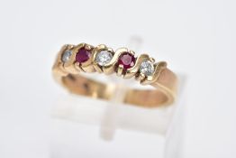 A 9CT GOLD RUBY AND CUBIC ZIRCONIA HALF ETERNITY RING, set with three circular cut cubic zirconia