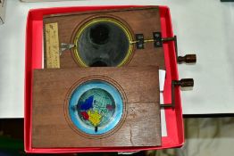 TWO HAND PAINTED MECHANICAL MAGIC LANTERN SLIDES, 'A diagram to prove the earths rotundity', (