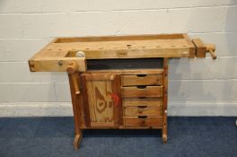 A SJOBERGS OF SWEDEN WORKBENCH comprising of two vices one cupboard and five drawers 136cm wide 76cm