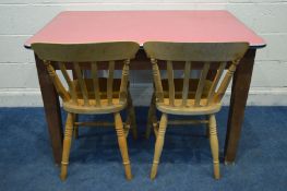 AN EARLY 20TH CENTURY STAINED PINE TABLE with a red Formica top length 121cm x depth 85cm x height