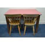 AN EARLY 20TH CENTURY STAINED PINE TABLE with a red Formica top length 121cm x depth 85cm x height