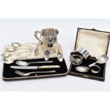 A SELECTION OF SILVER ITEMS, to include a silver cup with a scroll handle hallmarked Birmingham